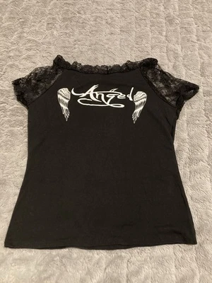 Blusa Demi Loon Laser preta asas de anjo mangas de renda tamanho XL motociclista streetwear - Imagem 1 de 4