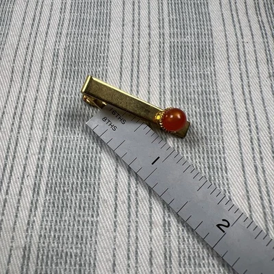 VTG Gold Tone Tie Clip Tie Bar, Skinny Tie Width NOS with Red Faux Stone #0399 - Image 1 of 4