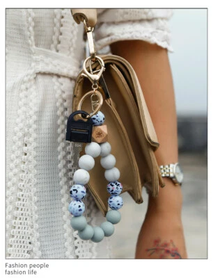 Pulsera pulsera con cuentas de silicona llavero brazalete llavero manos libres monedero regalo Foto 1 de 4