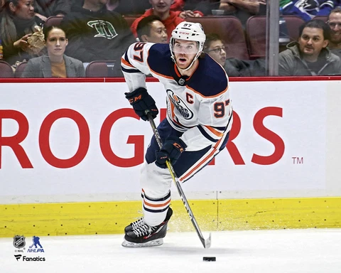 Connor McDavid Edmonton Oilers Unsigned White Jersey Skating 8" x 10" Photo Cover
