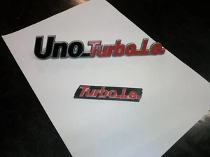 Set Emblemi posteriore e anteriore per Fiat Uno Turbo i.e. Iª serie - Picture 1 of 4