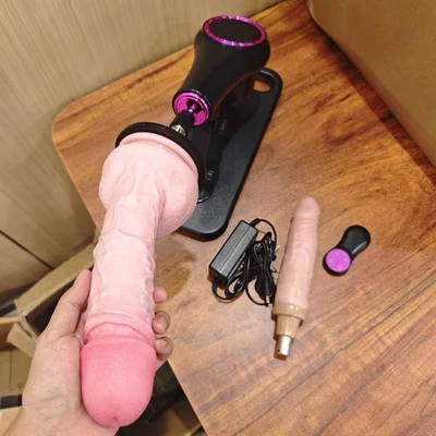 Máquina sexual automática enorme consolador de empuje masturbador remoto juguetes sexuales para mujeres Foto 1 de 4