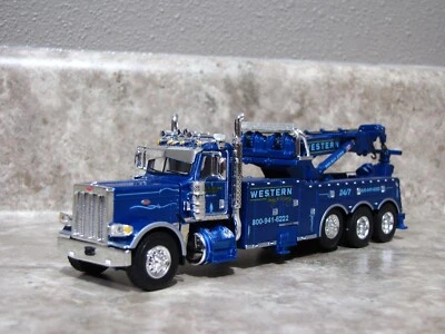 DCP 1/64 Blue Western Distributing 389 Peterbilt Rotator Wrecker Semi Truck Toy - Image 1 of 4