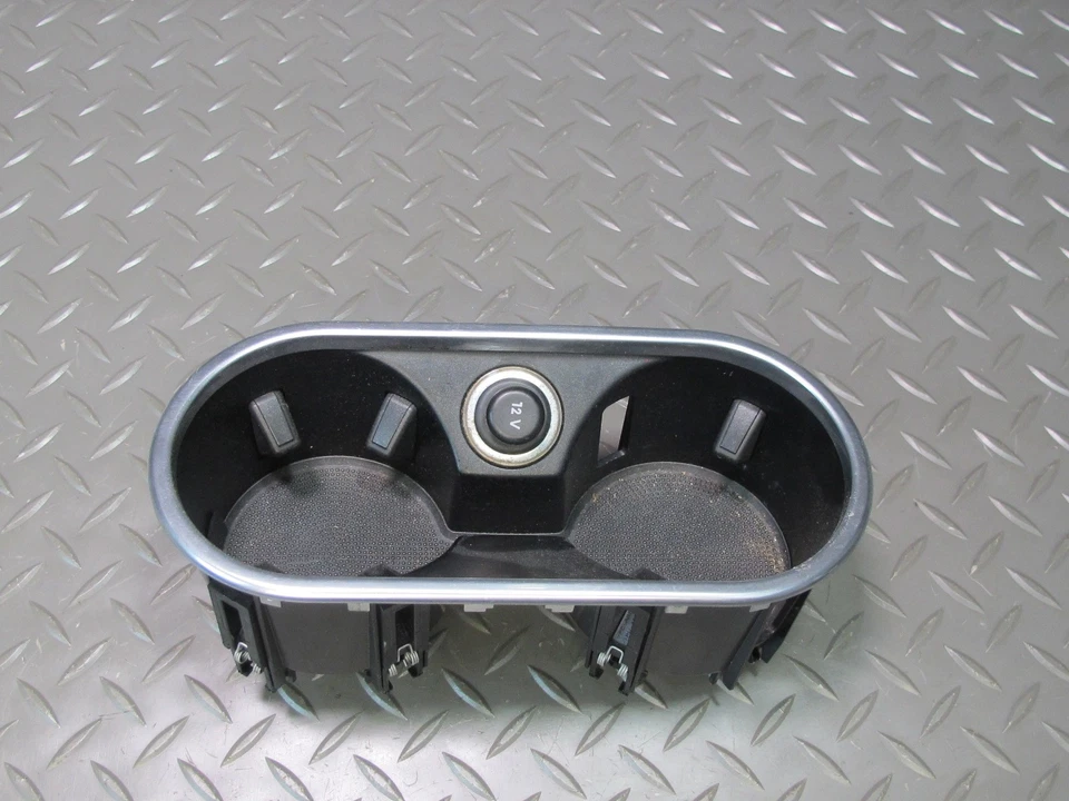 11-18 PORSCHE CAYENNE 958 CONSOLA CENTRAL DELANTERA PORTAVASOS CON TOMA DE 12V Foto 1 de 4