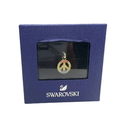 Swarovski Remix Collection Peace Charm tono dorado Foto 1 de 3