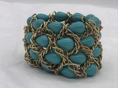 Brazalete elástico estilo cadena turquesa con cuentas y tono dorado Foto 1 de 4