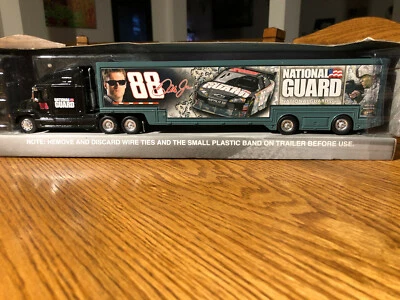 NASCAR WINNER'S CIRCLE DALE EARNHARDT JR. 88 NATIONAL GUARD SEMI TRUCK 1:64  - Image 1 of 4
