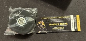 Anders Bjork Boston Bruins Autographed Puck COA INCLUDED - Picture 1 of 3