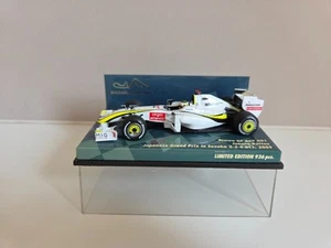 Pulsante Minichamps 1/43 Brawn Mercedes BGP001 J. - Suzuka Circuit 2009 (WC) - Foto 1 di 7