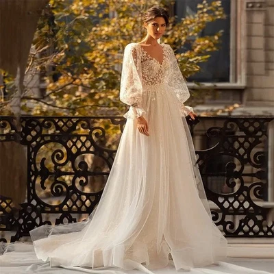 Luxury A-Line Wedding Dresses V-Neck Puff Long Sleeves Lace Flowers Bridal Gowns - Image 1 of 4