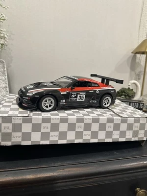 RC Nissan GTR 1/18th Scale Radio Control Car - Image 1 of 4