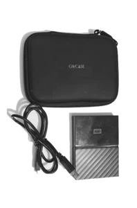 Disque dur externe portable Western Digital 4 To My Passport WDBYFT0040BBK USB3 - Photo 1/2