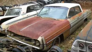 Radio Core AM con placa frontal sin perillas 1962 Oldsmobile Dynamic 88 4 puertas - Imagen 1 de 12