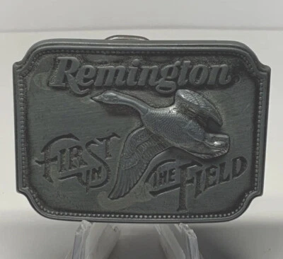 Hebilla de cinturón de caza Remington primera en el campo gansos pato cazador 1980 EE. UU. DE COLECCIÓN Foto 1 de 4