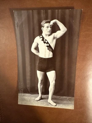 C 1910 Cheapside UK RPPC Strongman Chest Sash Medals Biceps Muscle Bare Feet - Image 1 of 4