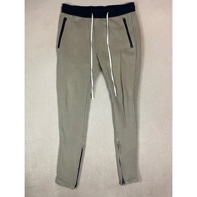 Pantalones de salón FOG Fear of God Essentials oliva con cordón cremallera al tobillo para hombre M Foto 1 de 4