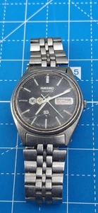 VTG SEIKO SQ Quartz Japan 7546-713L CK INOX CON PARTI FACCIALI NERE NON TESTATE - Foto 1 di 10