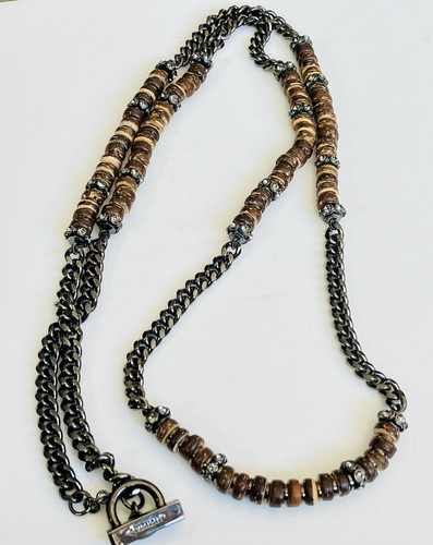 Collana in metallo con pistola firmata Givenchy con cristalli e perline in legno