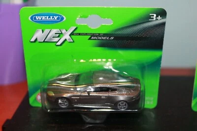 ASTON MARTIN - V12 VANTAGE - 2009 - MODELLINO WELLY SCALA 1/64 - Immagine 1 di 4