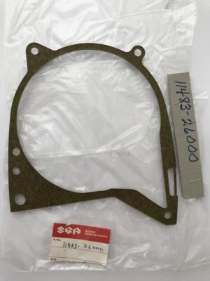 NOS SUZUKI 11483-26000 - JUNTA CUBIERTA CÁRTER Foto 1 de 3