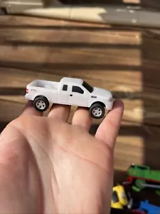Ford ERTL F-150 FX4 pickup fuoristrada bianco - Foto 1 di 7