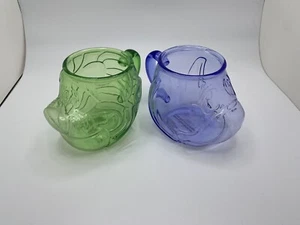 2 Vintage Disney Winnie Puuh Tassen/Tassen: Tigger + Eeyore, klares Kunststoffgesicht 3D - Bild 1 von 17