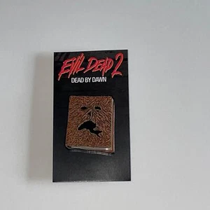 TRICK OR TREAT EVIL DEAD 2 NECROMICON ENAMEL PIN NEW MASFSC102 - Picture 1 of 3
