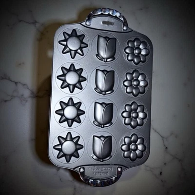 Sartén antiadherente para hornear Norpro para sol/flores/floral. PRIMAVERA VERANO Foto 1 de 4