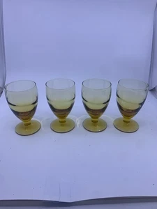 4 COPAS CON PATAS DE VIDRIO ÁMBAR. - Imagen 1 de 5