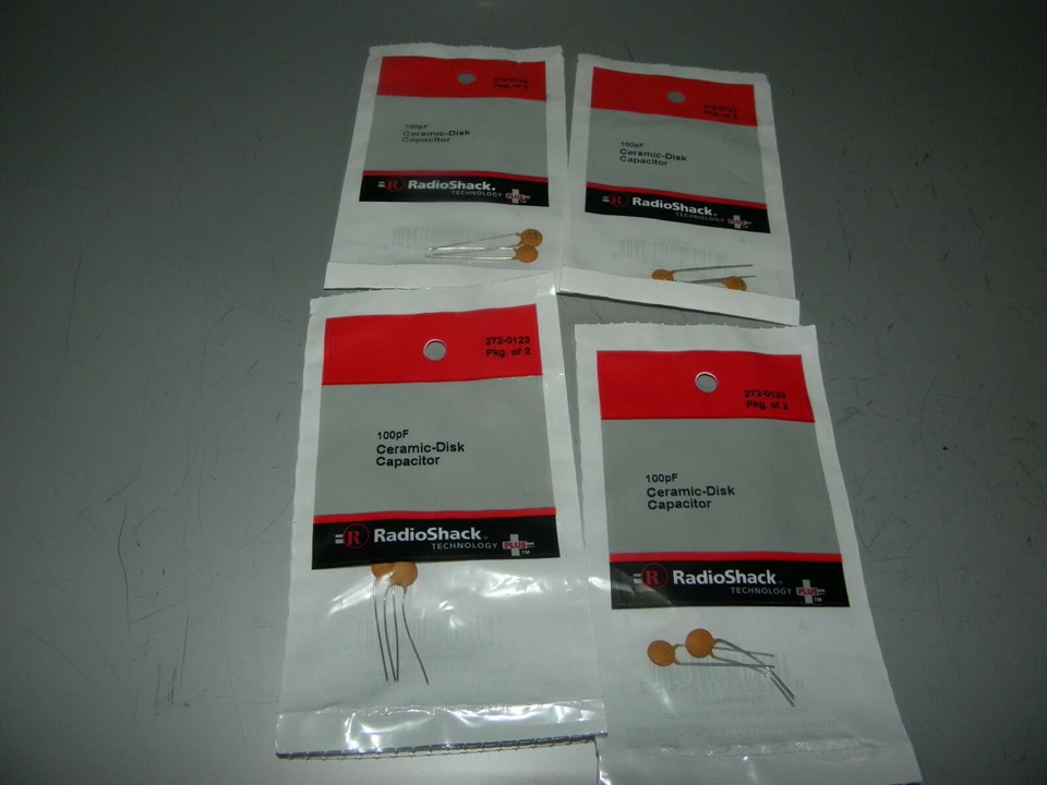 CUATRO 2 PAQUETES RADIOSHACK 272-0123 100pF CONDENSADORES DE DISCO CERÁMICO 50VDC Foto 1 de 1