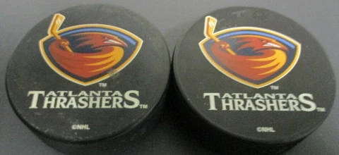 2 Atlanta Thrashers Hockey Pucks, 1999-2011,  Moved to Winnepeg in 2011 Cover