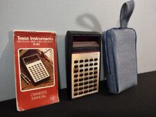 Calculatrice vintage années 1970 Texas Instruments TI-30 avec étui et manuel, travaux testés