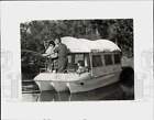 1963 Press Photo Family fishing from Seasport convertible cruiser - nei20336