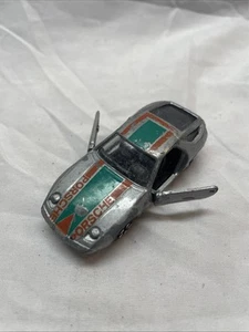 PlayArt Porsche 928 Argento 1/64 Made In Hong Kong Tampo Arancione/Verde - Foto 1 di 7