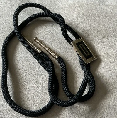 Corbata Swank Bolo vintage con monograma “D” negra dorada Foto 1 de 3