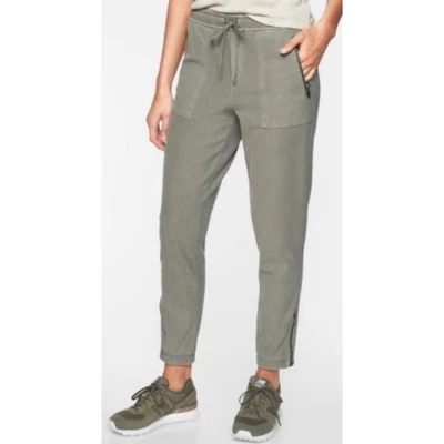 Pantalones de chándal para mujer Athleta verde Farallón bolsillos con cremallera tobillo cremallera talla 2 Foto 1 de 4