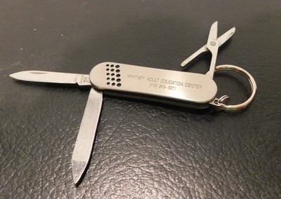 Многофункциональный инструмент брелок нож с рекламой серебристого тона см. фотографии - Изображение 1 из 4