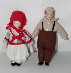 JUEGO DE DOS PIEZAS DE FIGURAS DE PORCELANA DE NIÑOS Y NIÑAS DE PORCELANA CASA DE PERSONAS - Imagen 1 de 4