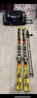 Esquís The Atomic SX:11 180 cm con fijaciones y un par de bastones de esquí Scott + bolsa Foto 1 de 2