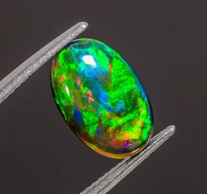 Natural Black Ethiopian Opal Oval Shape Fire Opal Loose Gemstone 2.1 Ct 12X7X4mm - Picture 1 of 4