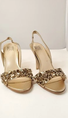 PELLA MODA "YASMINA" PEDRA DE CASCA OURO METÁLICO tamanho 7. - Imagem 1 de 4