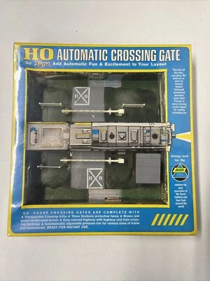 AHM/Lima #5602 HO Scale Operating Crossing Gate  Sealed - Image 1 of 3