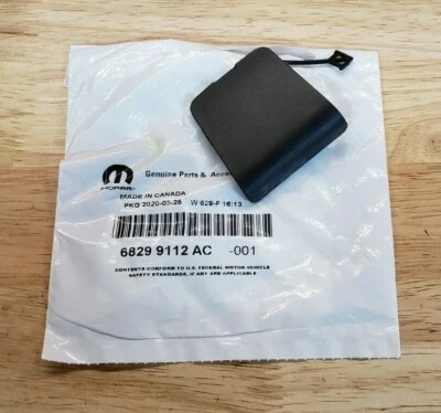 NEW 2019-2026 Ram 1500 (DT) Spare Tire Winch Cover, OEM - Image 1 of 3