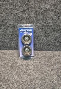 set of "Bearing Buddy" stainless steel trailer wheel bearing protectors. - Picture 1 of 3