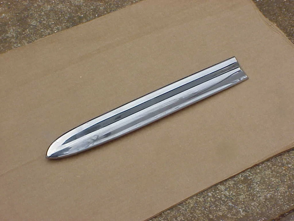 Dodge Coronet Meadowbrook 1953 53 nuevo en stock MoPar guardabarros izquierdo moldura lateral 1435496 Foto 1 de 1