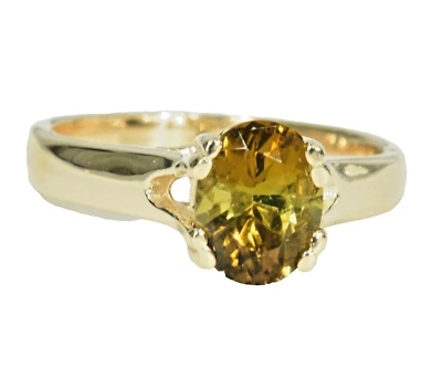 Anillo banda andaluza ovalada de oro macizo de 14 quilates extraído en tierra Foto 1 de 4