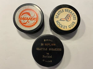 Three (3) Vintage SEATTLE BREAKERS WHL Hockey Pucks Western Hockey League - Picture 1 of 1