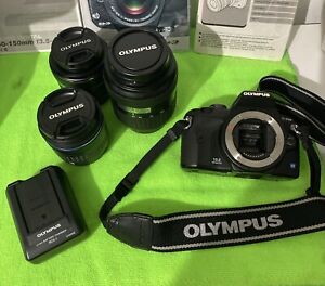 olympus e-410 digital slr with 3 Lenses, Charger, Battery, XD Card And Manual!