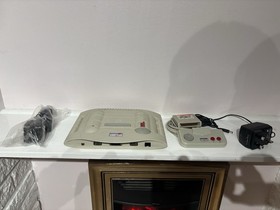 Amstrad GX4000 Console with Burning Rubber Game and Controller