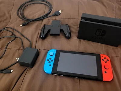 Nintendo Switch 32GB + 128GB SD Card, Dock, Cables and Grip (HAC-001) Red & Blue - Image 1 of 2